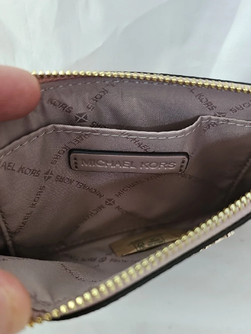 Michael Kors Blush Pink Signature Wristlet with Gold Hardware